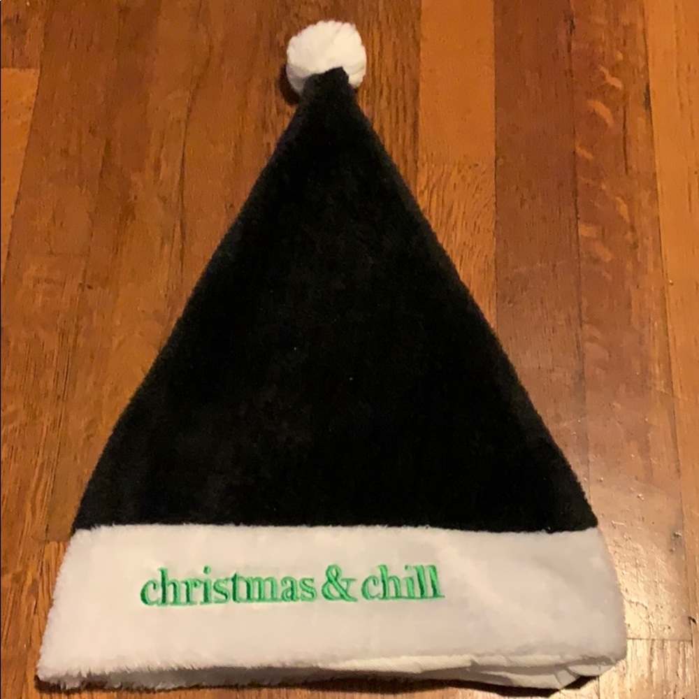 Ariana Grande Christmas and chill Santa hat.
